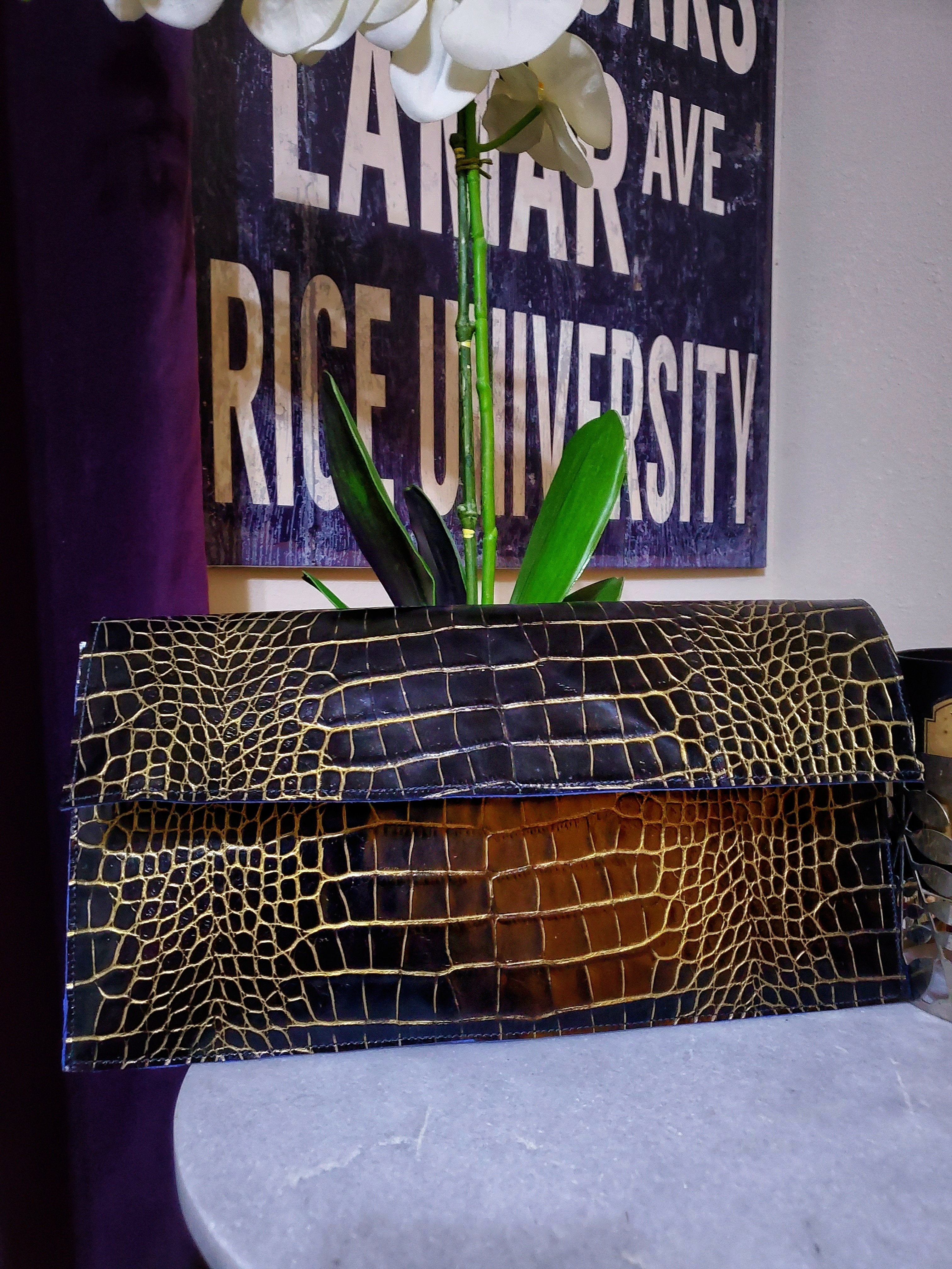 Custom leather clutch base price.   Email Info@3degreesrunway.com for consultation on leather and color options.  Dimensions 14.5" L × 8 " W Brass Zipper closure  Magnetic closure inside flap Suede lining  Inside Pocket 