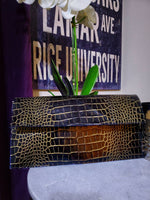 Custom leather clutch base price.   Email Info@3degreesrunway.com for consultation on leather and color options.  Dimensions 14.5" L × 8 " W Brass Zipper closure  Magnetic closure inside flap Suede lining  Inside Pocket 