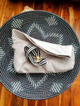 First to the 50 Shades of Color + Grey is this icy pearlized white lambskin leather paired with a velvet textured fabric.  You like your options right?  This clutch comes with removable straps for versatility.  Folder over as a clutch or wear it across your shoulders  Dimensions (straight and unfolded):  17" L x 12" W 100 % lambskin leather Cotton lining Inside pocket Magnetic closure